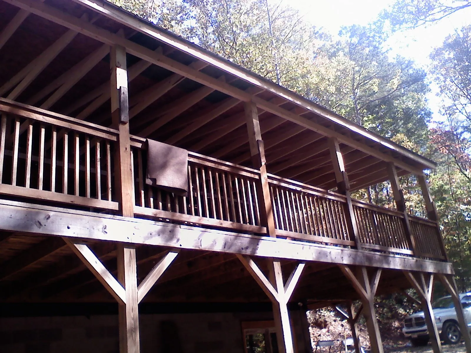 Timber framing under a new elevated porch and deck — Roof Leak Repair in Nolanville by Roofing Brothers